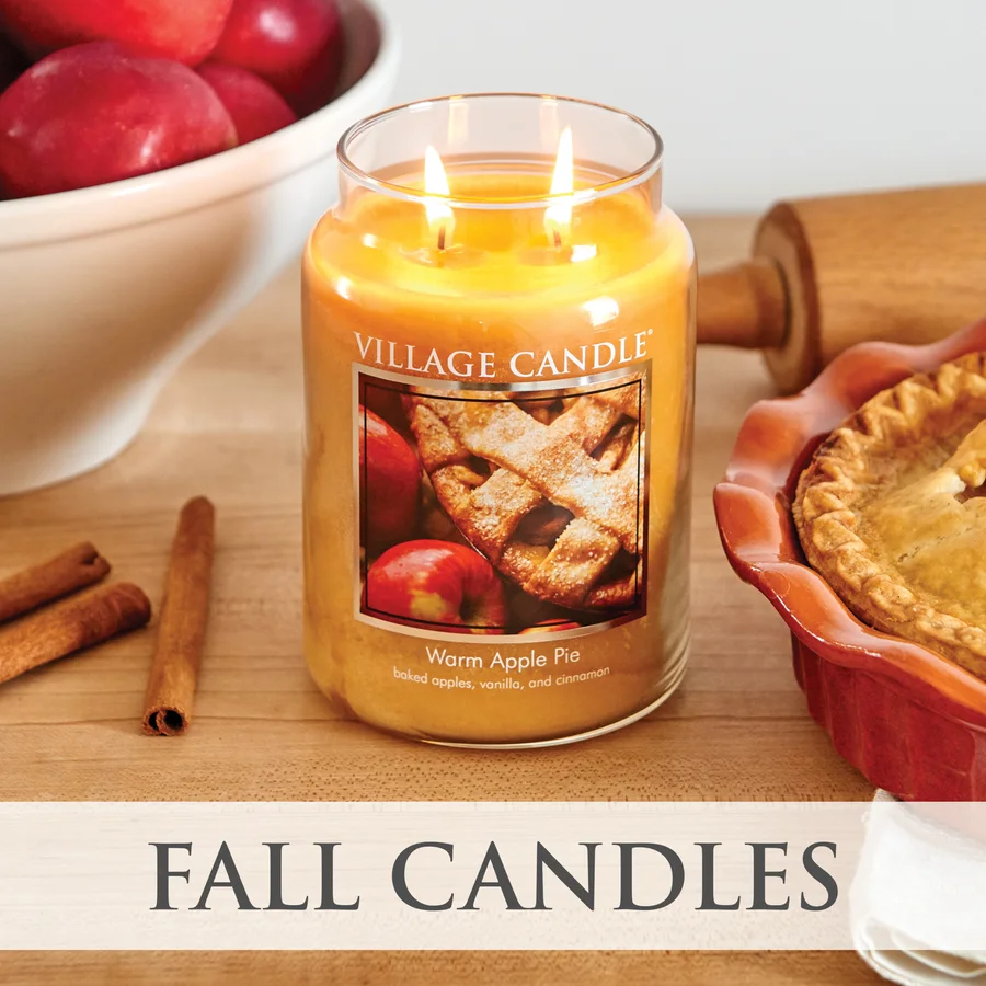 Warm Apple Pie jar candle beside a baked pie and cinnamon sticks, captioned Fall Candles